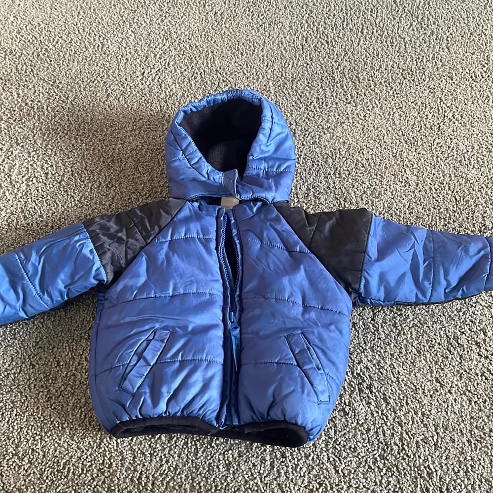 Old navy baby size 6-12 months size blue puffer jacket .